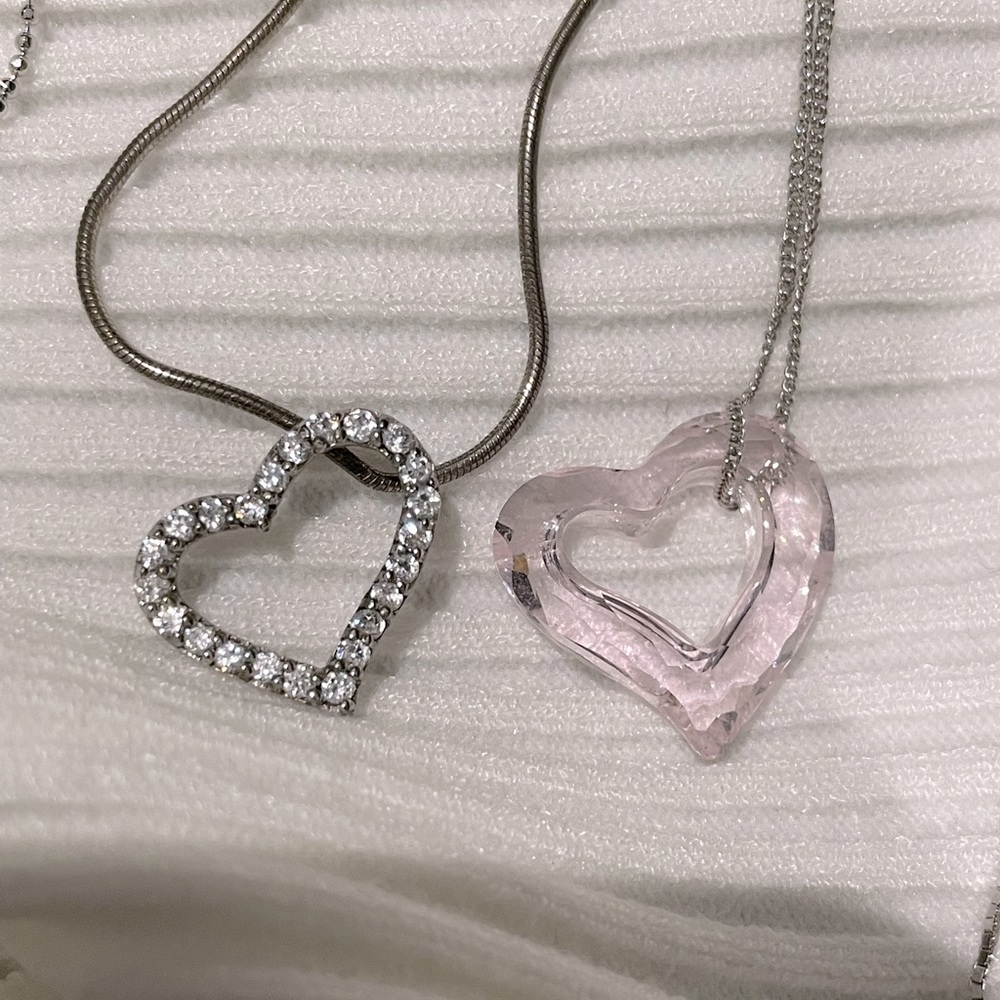 3 heart necklaces and one extra chain